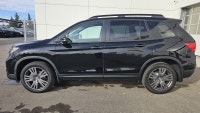 Our 2021 Honda Passport EX-L in Crystal Black Pearl is in stock and all up to date on maintenance af... (image 1)