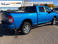 The 2021 Ram 2500 Big Horn 4x4 Crew Cab is a powerhouse wrapped in a stunning blue exterior. Coupled... (image 2)
