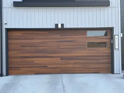 FOR SALE: 16x7 Insulated Garage Door - Artisan Wood Grain Finish, View more