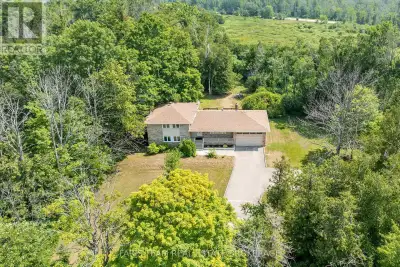 Top 5 Reasons You Will Love This Home: 1) Tucked away on a rare 0.8-acre lot, this property feels li...