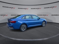 This Volkswagen Jetta has a powerful Turbo Gas 4cyl 1.5L engine powering this Automatic transmission... (image 7)