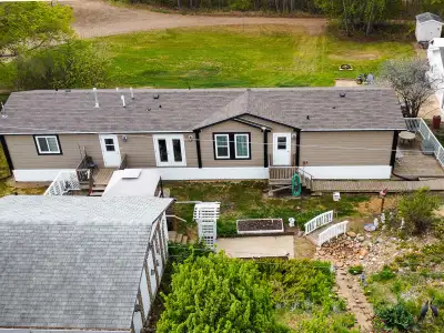 Nestled along the scenic banks of the Smoky River, this picturesque property in Watino offers the ul...
