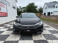 A well-equipped compact sedan with a refined interior, advanced tech features, and efficient turboch... (image 1)