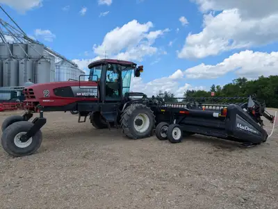 Unit 2 2009 Macdon M200 Windrower Swather. Engine hrs: 2,848 Header HRS: 2,189 Cat Motor 200hp. D60D...