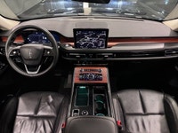 The 2024 Lincoln Aviator Reserve is a refined and powerful three-row luxury SUV that offers a compel... (image 8)