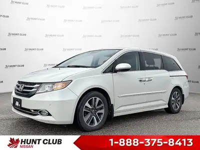 Simplify family journeys with the 2016 Honda Odyssey Touring. This white minivan, with 157,038 kilom...