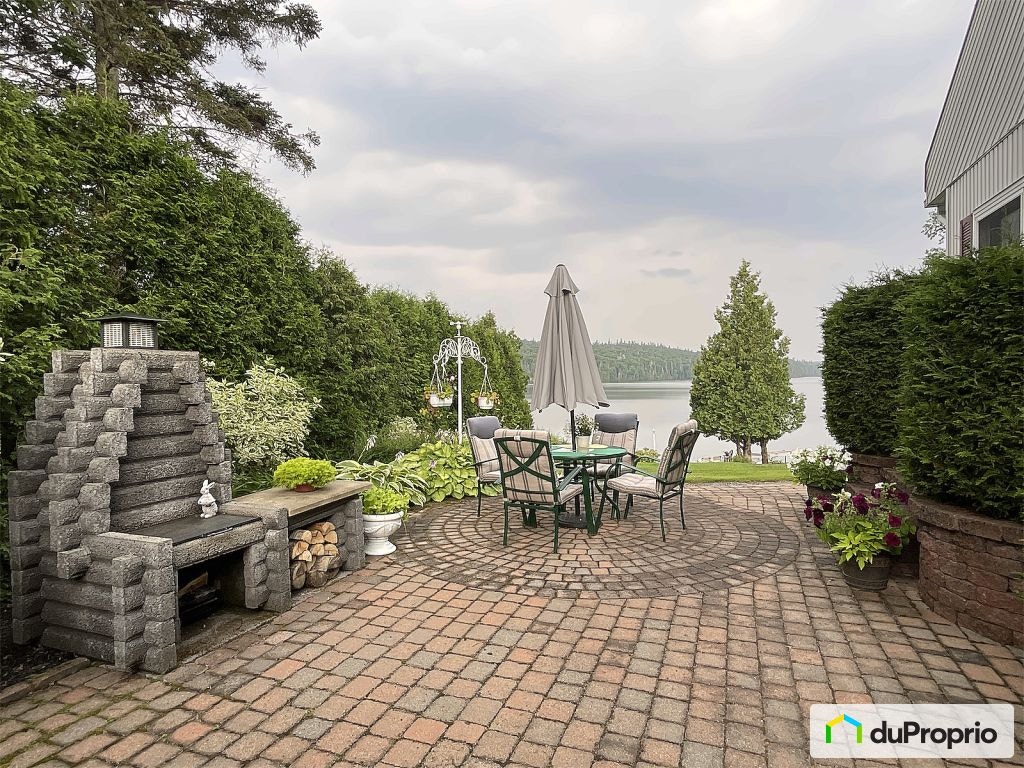 $678,000 - Bungalow for sale in St-David-de-Falardeau — photo 1