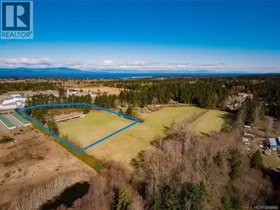 This strategically located acreage offers great investment and personal living options. Situated jus...