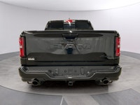 Drive into the future with the stunning 2026 Ram 1500 Sport 4x4 Crew Cab, wrapped in a sleek black e... (image 3)