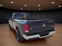 Experience the perfect blend of power and style with the 2020 Ram 1500 Classic SLT 4x4 Reg Cab, dres... (image 3)
