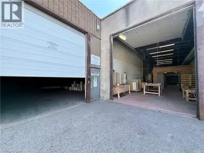 1,600 SF industrial unit with 16 ft clear height and an open warehouse layout. Unit includes one 10...