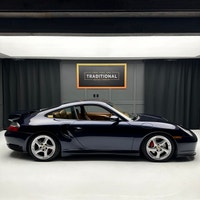 Check out this 2003 Porsche 911 Twin Turbo. This is the very desirable Midnight Blue Metallic with N... (image 4)