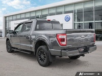 * Leather-trimmed heated and ventilated front bucket seats with a 10-way power driver's seat * 12-in... (image 2)