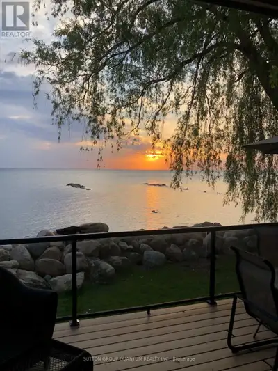 AUTHENTIC + CHARMING WATERFRONT COTTAGE RENTAL. Cozy, authentic 2-bedroom cottage nestled on pristin...