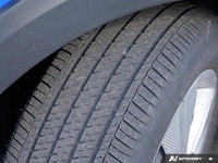 Navigate city streets with confidence and style in the 2022 Nissan Kicks S, striking in Electric Blu... (image 6)