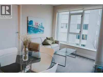 With floor-to-ceiling windows and gorgeous furnishings, this 1 bedroom, 1 bathroom and den West End...