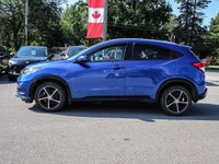 Experience the excitement of driving the **2019 Honda HR-V Sport** in stunning blue, equipped with a... (image 4)