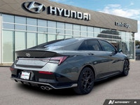 The crisp 2025 Hyundai Elantra N Line Ultimate, sporting a dynamic Amazon Grey exterior and a sophis... (image 4)