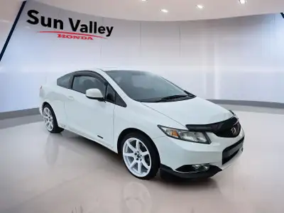 The 2013 Honda Civic Si is a sporty compact that combines performance and practicality. With its man...