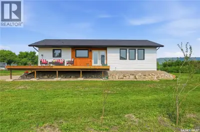 Where does Katepwa Lake access, expansive valley and lake views, and a spacious move in ready home m...