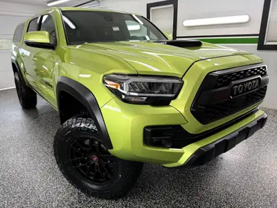 We have a RARE, SUPERCHARGED, ELECTRIC LIME METALLIC 2022 Toyota Tacoma TRD PRO 4x4! This truck look...