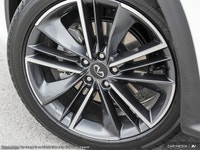 The 2025 INFINITI QX50 Sport is a bold, blacked-out luxury SUV that currently holds the #1 spot for... (image 6)