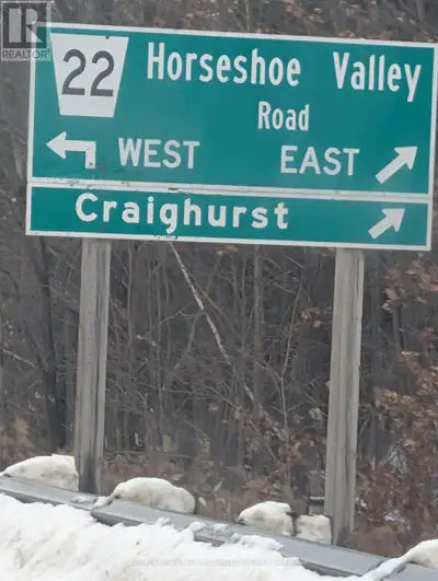 Available immediately industrial 1.28 acres. 8' fully fenced gravel lot, with double wide 2-sided ga...