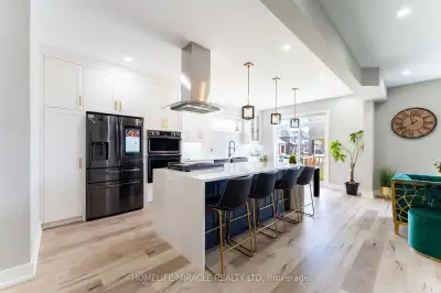 AD #3183 Custom-built detached home by Kenmore located in highly sought-after community of Doon Sout...
