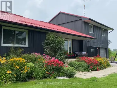 Country living just minutes from town on a spacious lot with plenty of room to enjoy the outdoors. T...