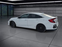 The 2020 Honda Civic Si Sedan in white offers a dynamic driving experience with its FWD drivetrain a... (image 5)