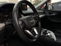 The 2019 Q7 is a mid-size luxury SUV known for its car-like handling, high-quality interior material... (image 4)