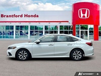 Drive with confidence and sophistication in this immaculate white 2022 Honda Civic Sedan LX. Experie... (image 1)