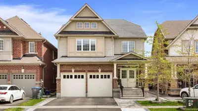 5 Bedrooms at 2nd level / Living room /Family room/Finished basement / separate Dining / side Entran...