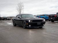 This 2016 Dodge Challenger R/T is powered by a classic 5.7L HEMI V8 engine paired with a smooth auto... (image 9)