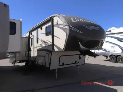 Guarantee RV Calgary's largest selection of pre-owned inventory. With triple slides and a rear livin...