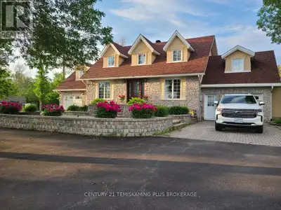Majestic 2 story colonial home on the prestigious Dawson Point road has 3 garages, 3 bedrooms, 3.5 b...