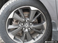 Single-owner vehicle with no reported accidents »» Grey exterior with refined styling »» Smooth auto... (image 5)