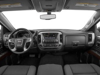 The 2017 GMC Sierra 1500 4WD Crew Cab Short Box SLE in a striking gray color combines powerful 44 ca... (image 4)