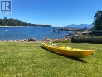 WALK-ON WATERFRONT! This waterfront property offers a combination of exceptional home and awe inspir...