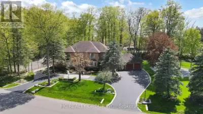 Welcome to this beautifully maintained estate sits on a premium 1-acre lot with over 270 ft of front...