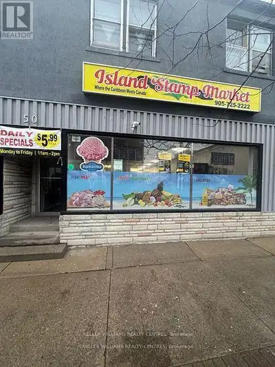 Spacious marketplace business for sale, featuring high ceilings and a bright, open layout. The busin...