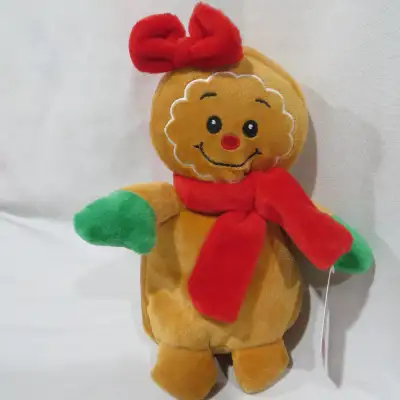 -8" -soft and cuddly -green mittens/red scarf and bow -face details sewn on so no safe for baby -new