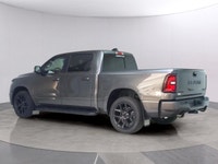 The 2025 Ram 1500 Sport 4x4 Crew Cab in an attractive gray is an impressive blend of power and luxur... (image 2)