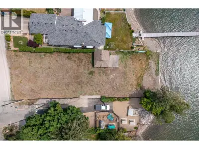 One of a kind Level Lakeshore building lot at the end of a private Lane . City services are to the l...