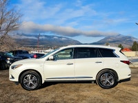 The 2017 INFINITI QX60 AWD in elegant white is a true performer with its reliable all-wheel drive an... (image 1)