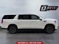 The 2025 GMC Yukon XL Elevation 4WD blends extended-length versatility with bold, monochromatic styl... (image 5)