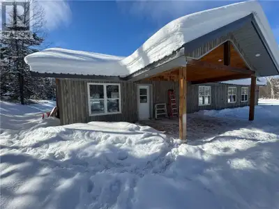 Welcome to this beautifully custom built, slab on grade home, offering effortless one-level living i...