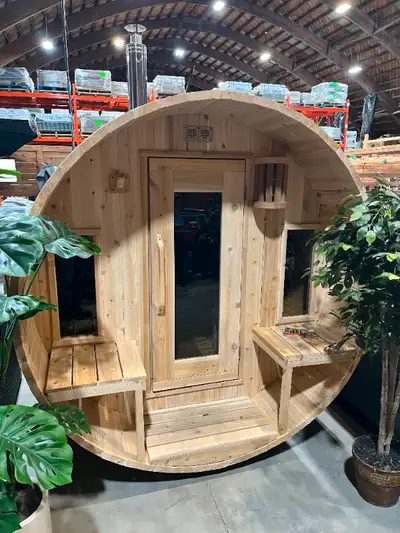 This Canadian Timber Tranquility Barrel Sauna with 45cm Porch that seats 6-8 people is handcrafted f...