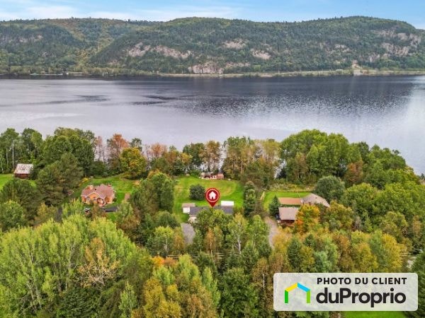 $629,000 - Cottage for sale in Shawinigan (St-Jean-Des-Piles) — photo 1