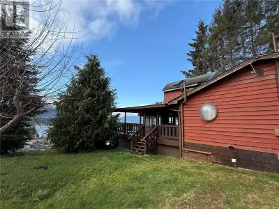 Charming Ocean View Home with Unique Character. Welcome to a home with incredible potential, perched...